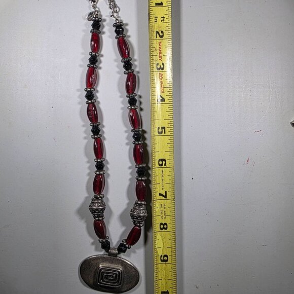 Chicos Red & Black Beaded Necklace With Oval Metal Pendant Swirl design - Picture 6 of 6
